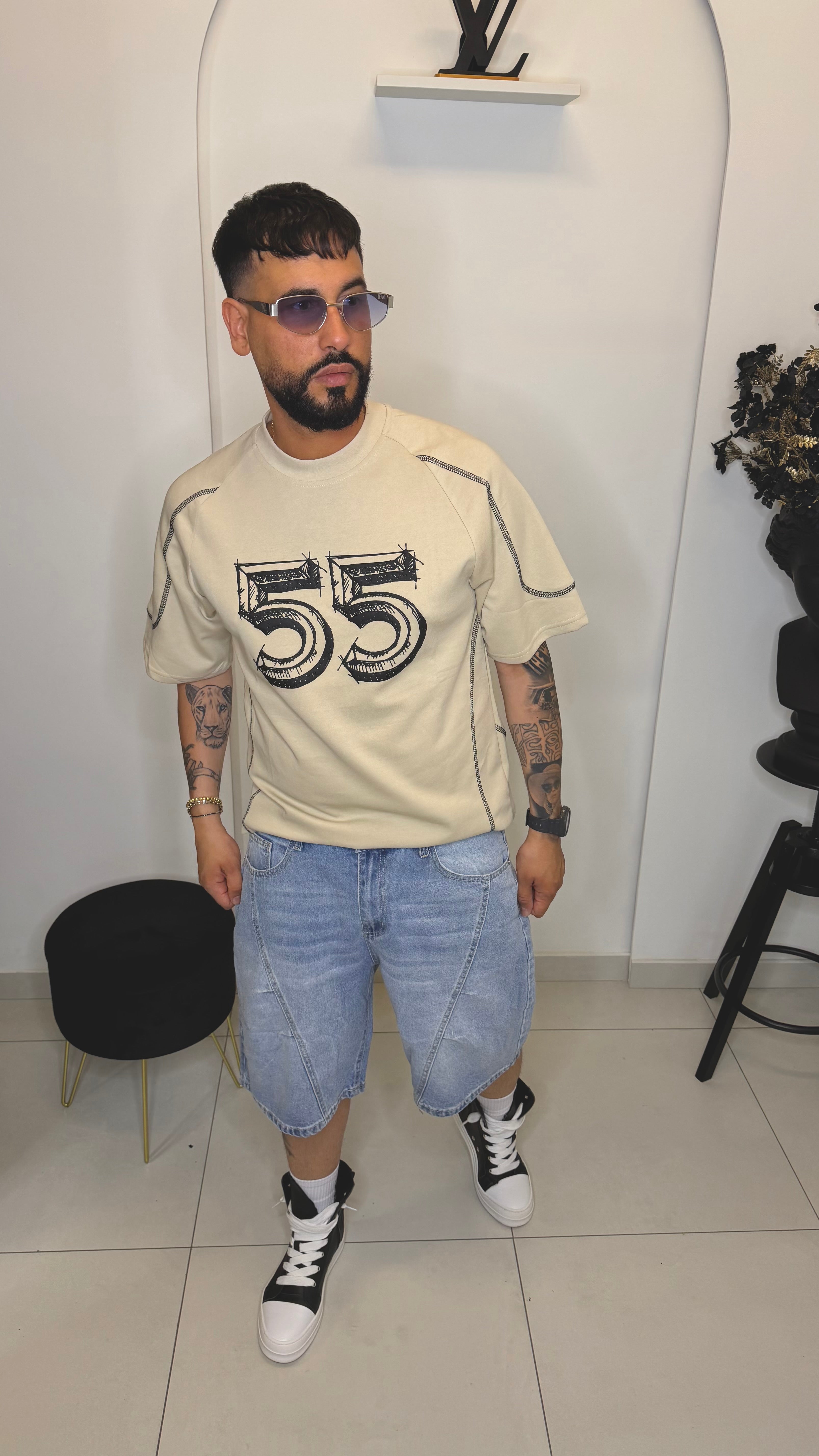 Pantaloncino baggy fit con riga