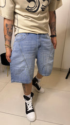 Pantaloncino baggy fit con riga